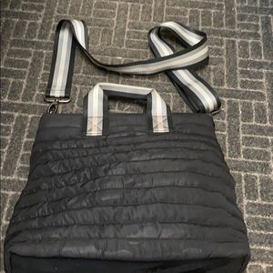 Black camo Think Royln crossbody bag.